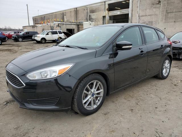 FORD FOCUS SE 2015 with VIN 1FADP3K2XFL381043 - Photo from auction