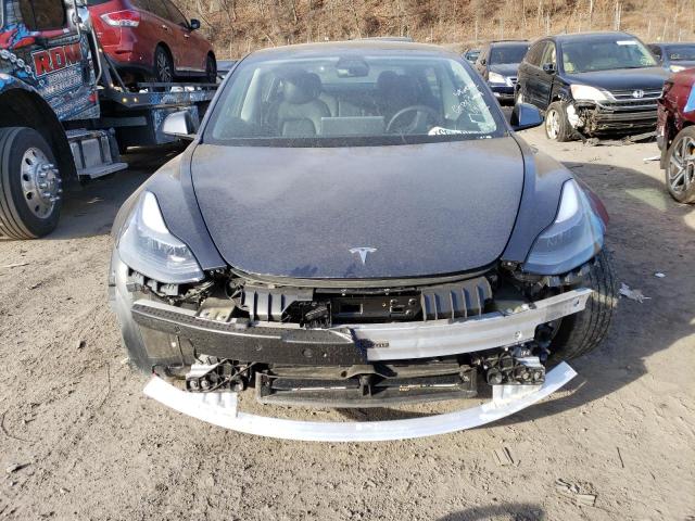 Photo 5 from auction – 2021 TESLA MODEL 3 with VIN 5YJ3E1EBXMF049647