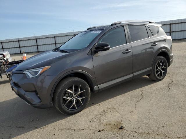 Photo 1 from auction – 2018 TOYOTA RAV4 SE with VIN 2T3NFREV9JW426084