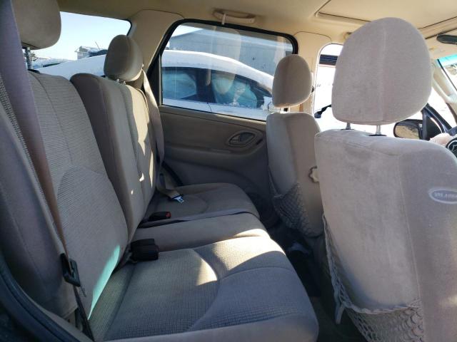 Photo 11 from auction – 2003 MAZDA TRIBUTE LX with VIN 4F2CZ94133KM20046