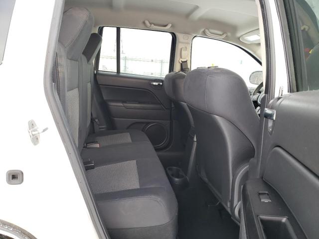Photo 11 from auction – 2011 JEEP COMPASS with VIN 1J4NF4FBXBD154709