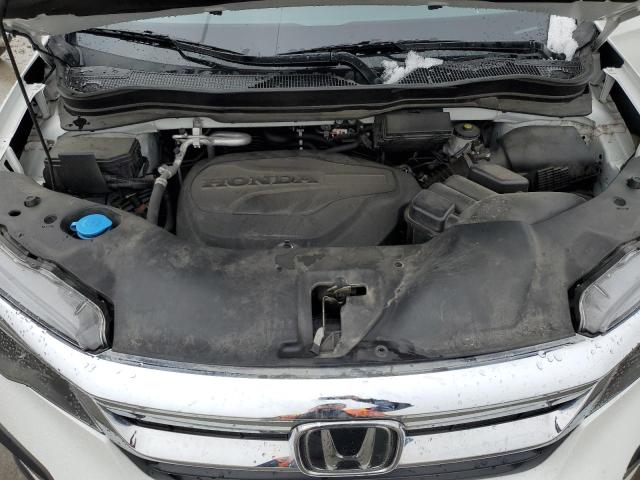 Photo 12 from auction – 2021 HONDA PILOT EXL with VIN 5FNYF5H52MB035578