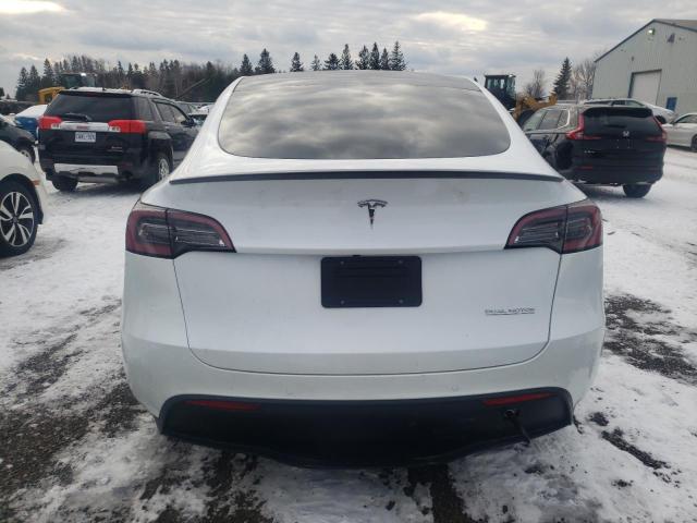 Photo 6 from auction – 2022 TESLA MODEL Y with VIN 7SAYGDEF9NF572523