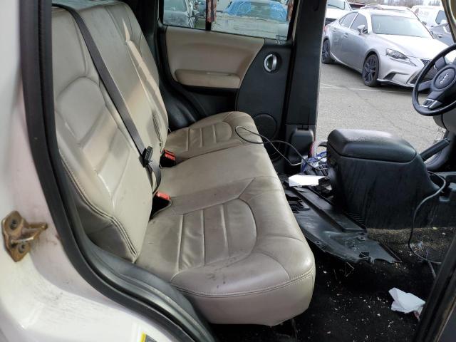 Photo 11 from auction – 2002 JEEP LIBERTY LI with VIN 1J8GL58K52W262677