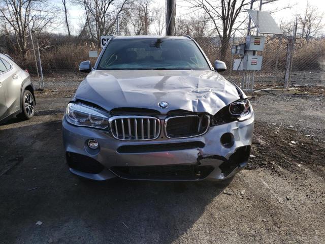 Photo 5 from auction – 2016 BMW X5 XDRIVE5 with VIN 5UXKR6C55G0J79654