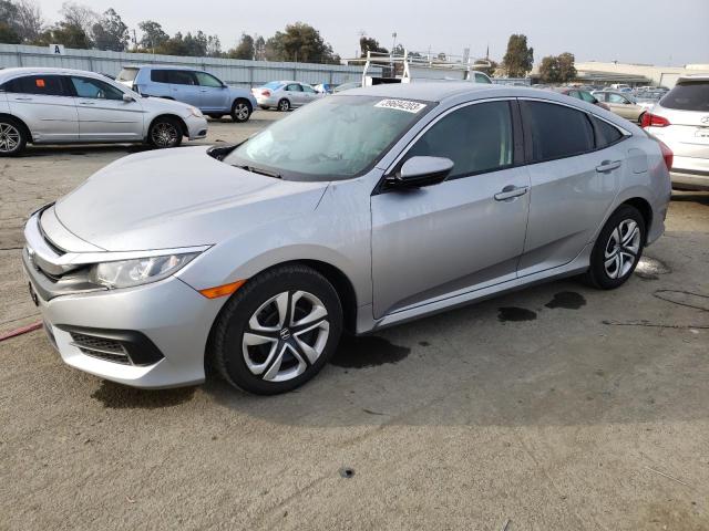 HONDA CIVIC LX 2018 with VIN 19XFC2F53JE209791 - Photo from auction