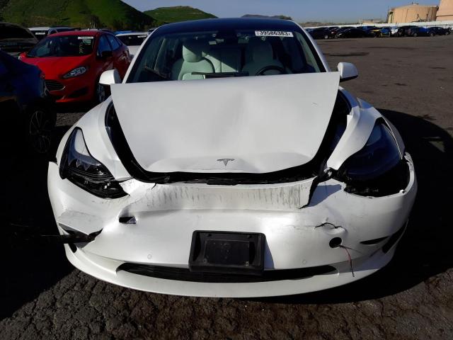 Photo 5 from auction – 2021 TESLA MODEL 3 with VIN 5YJ3E1EA8MF873332