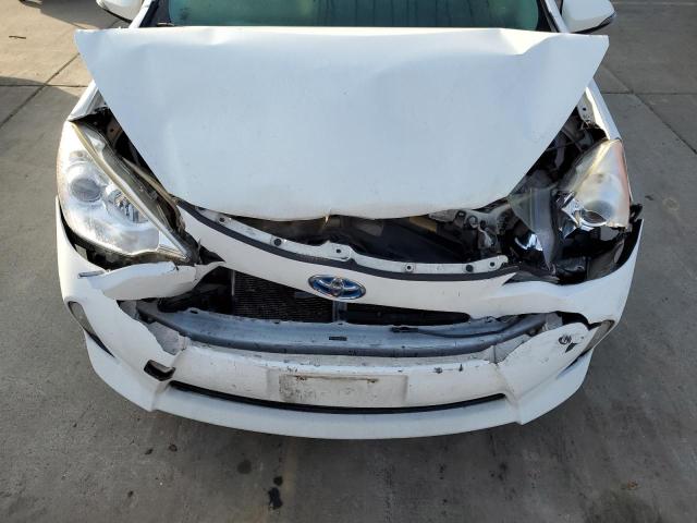 Photo 11 from auction – 2014 TOYOTA PRIUS C with VIN JTDKDTB33E1084936