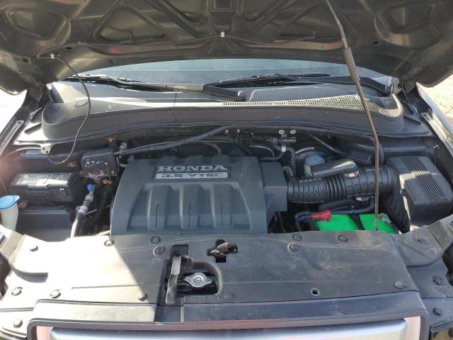 Photo 12 from auction – 2006 HONDA PILOT EX with VIN 2HKYF18706H530280