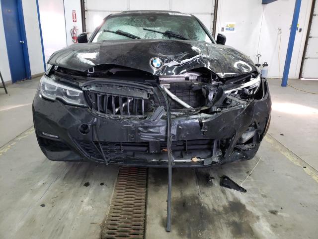 Photo 5 from auction – 2020 BMW 330I with VIN 3MW5R1J03L8B44388