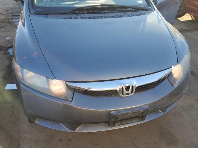 Photo 11 from auction – 2011 HONDA CIVIC LX with VIN 19XFA1F5XBE000422