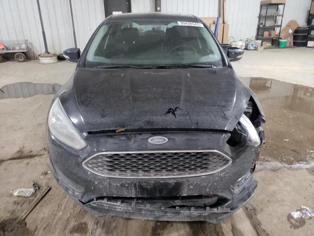 Photo 5 from auction – 2016 FORD FOCUS SE with VIN 1FADP3F28GL267683