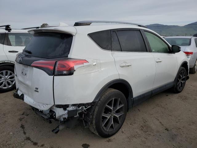 Photo 3 from auction – 2017 TOYOTA RAV4 SE with VIN JTMJFREV4HD214750