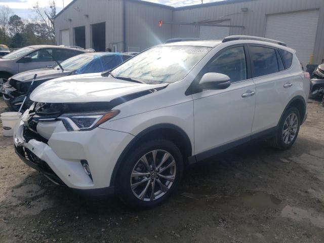TOYOTA RAV4 LIMIT 2017 with VIN JTMYFREV5HD099025 - Photo from auction