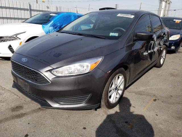 FORD FOCUS SE 2018 with VIN 1FADP3F21JL324300 - Photo from auction