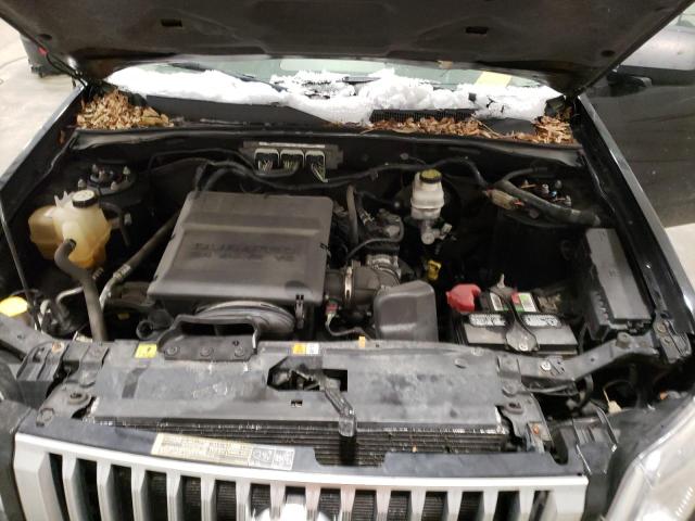 Photo 11 from auction – 2011 MERCURY MARINER with VIN 4M2CN9BG3BKJ05842