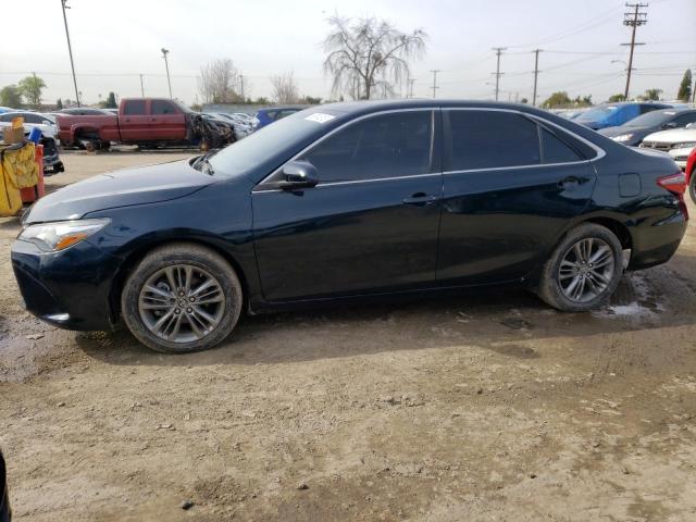TOYOTA CAMRY LE 2017 with VIN 4T1BF1FK0HU310641 - Photo from auction
