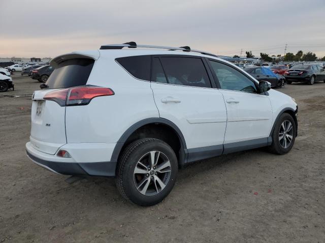 Photo 3 from auction – 2016 TOYOTA RAV4 XLE with VIN 2T3WFREV3GW276163