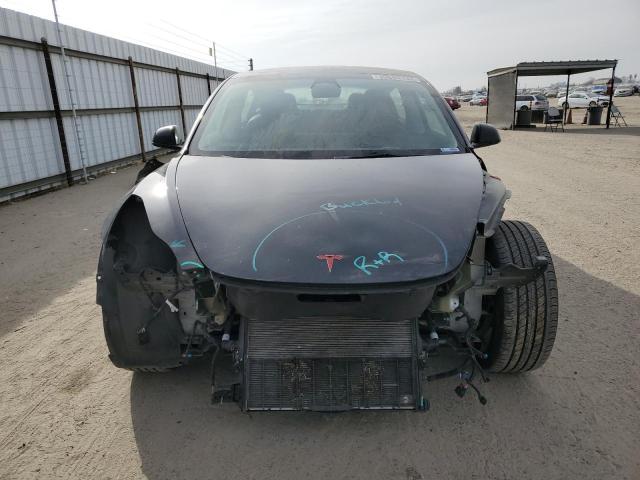 Photo 5 from auction – 2022 TESLA MODEL 3 with VIN 5YJ3E1EB3NF253918