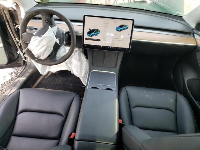 Photo 8 from auction – 2022 TESLA MODEL 3 with VIN 5YJ3E1EA9NF101262