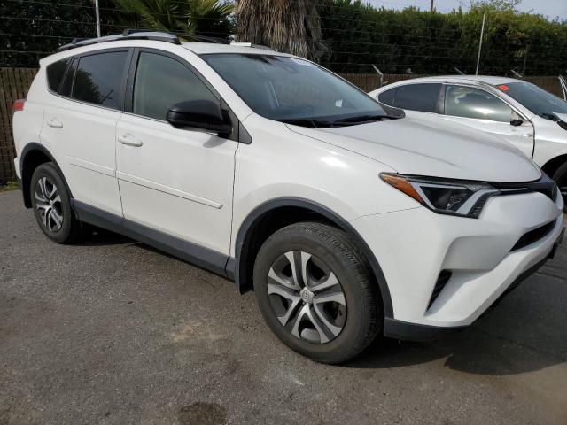 Photo 4 from auction – 2017 TOYOTA RAV4 LE with VIN JTMZFREV1HJ135573