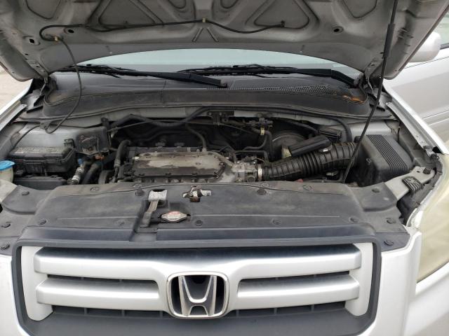 Photo 12 from auction – 2006 HONDA PILOT EX with VIN 5FNYF28526B042578