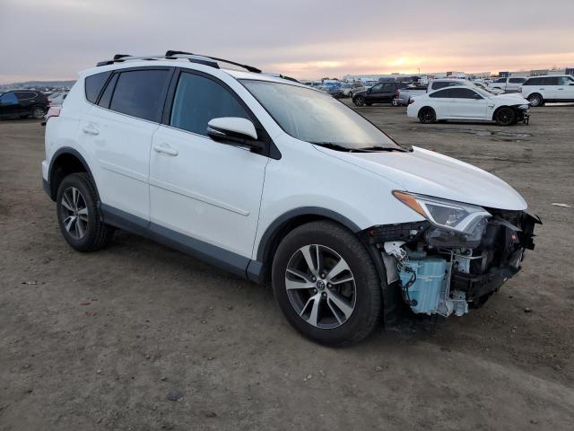 Photo 4 from auction – 2016 TOYOTA RAV4 XLE with VIN 2T3WFREV3GW276163