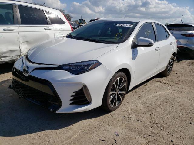 TOYOTA COROLLA L 2018 with VIN 5YFBURHE8JP846160 - Photo from auction