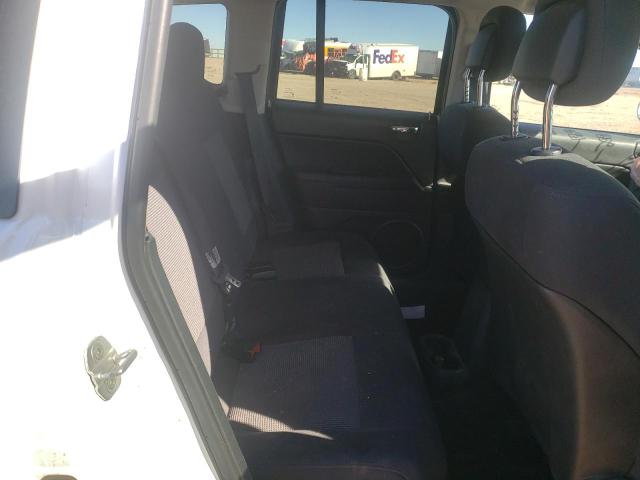 Photo 11 from auction – 2011 JEEP COMPASS SP with VIN 1J4NT1FB8BD299187