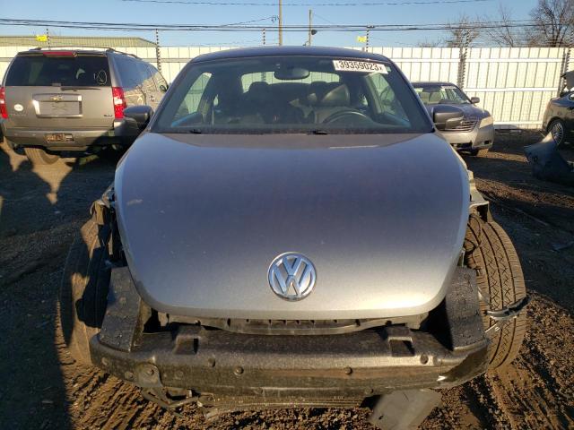 Photo 5 from auction – 2013 VOLKSWAGEN BEETLE with VIN 3VWJP7AT0DM684792