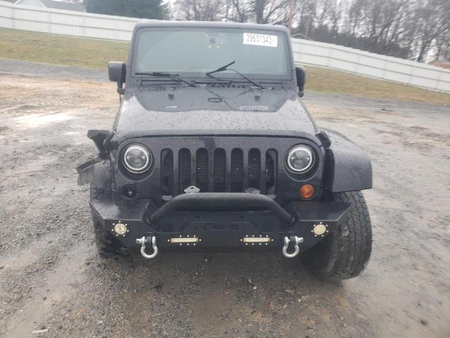 Photo 5 from auction – 2013 JEEP WRANGLER U with VIN 1C4BJWDGXDL669543