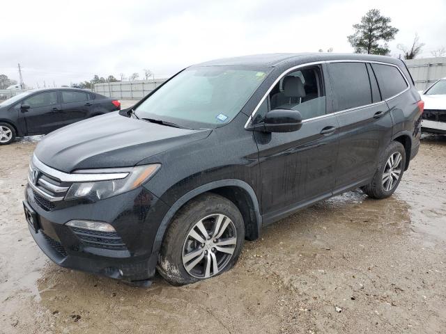 HONDA PILOT EXLN 2018 with VIN 5FNYF5H78JB025571 - Photo from auction