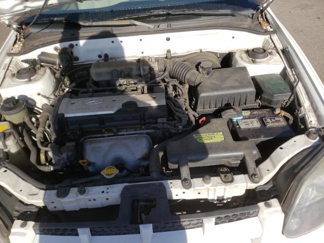 Photo 11 from auction – 2004 HYUNDAI ACCENT GL with VIN KMHCG35C84U310002