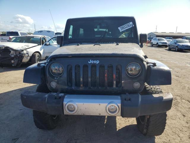 Photo 5 from auction – 2015 JEEP WRANGLER U with VIN 1C4BJWEG4FL619528