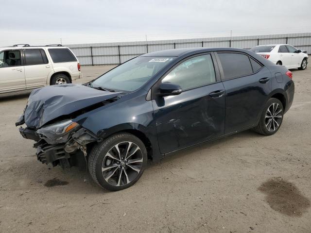 TOYOTA COROLLA L 2018 with VIN 2T1BURHE0JC019821 - Photo from auction