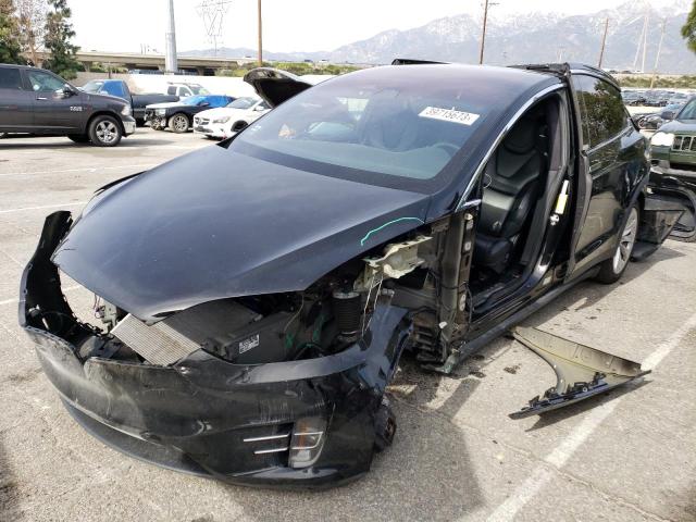 TESLA MODEL X 2018 with VIN 5YJXCDE26JF091396 - Photo from auction