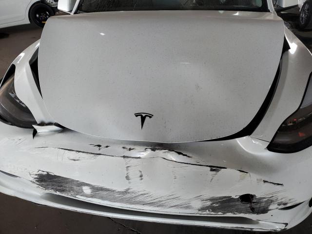 Photo 11 from auction – 2021 TESLA MODEL Y with VIN 5YJYGDEE4MF075141