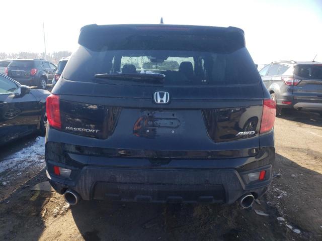Photo 6 from auction – 2022 HONDA PASSPORT E with VIN 5FNYF8H59NB027044