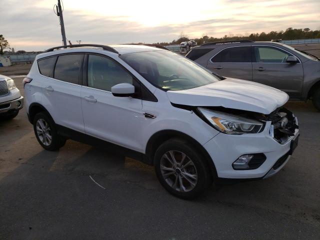 Photo 4 from auction – 2017 FORD ESCAPE SE with VIN 1FMCU9GD3HUB34547