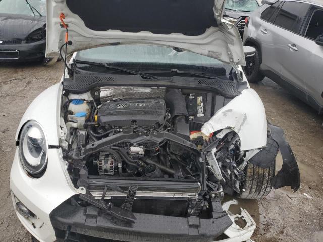 Photo 11 from auction – 2014 VOLKSWAGEN BEETLE with VIN 3VWJ17AT8EM650134
