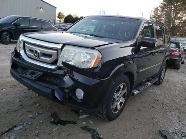 HONDA PILOT TOUR 2011 with VIN 5FNYF4H91BB015963 - Photo from auction