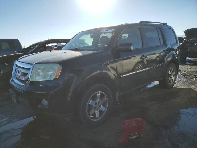 HONDA PILOT TOUR 2009 with VIN 5FNYF48809B031458 - Photo from auction