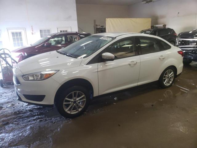 FORD FOCUS SE 2017 with VIN 1FADP3F25HL296589 - Photo from auction