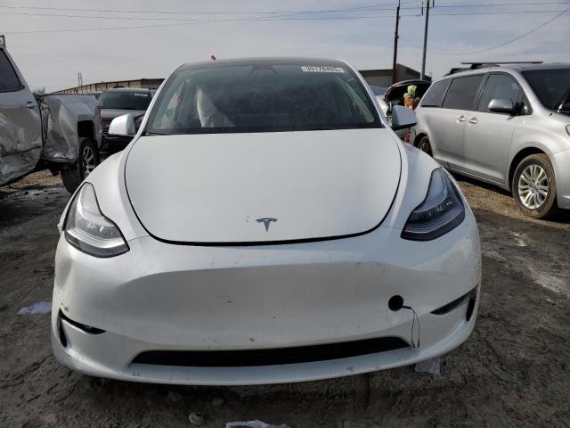 Photo 5 from auction – 2023 TESLA MODEL Y with VIN 7SAYGDEE2PF599007
