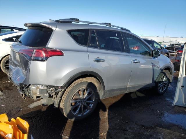 Photo 3 from auction – 2018 TOYOTA RAV4 LIMIT with VIN JTMDFREV6JD235635