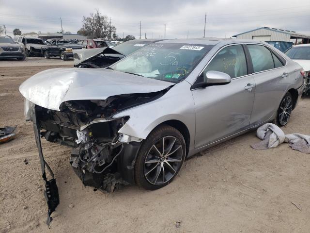 TOYOTA CAMRY LE 2016 with VIN 4T1BF1FKXGU249023 - Photo from auction