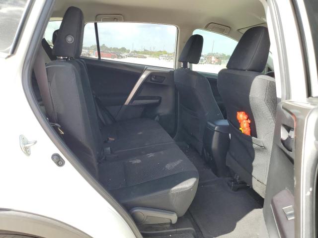 Photo 11 from auction – 2018 TOYOTA RAV4 LE with VIN JTMZFREV2JJ160682