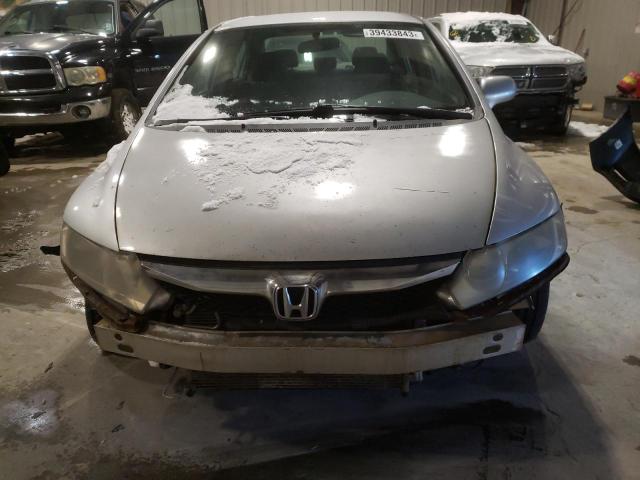 Photo 5 from auction – 2011 HONDA CIVIC LX with VIN 19XFA1F5XBE030651