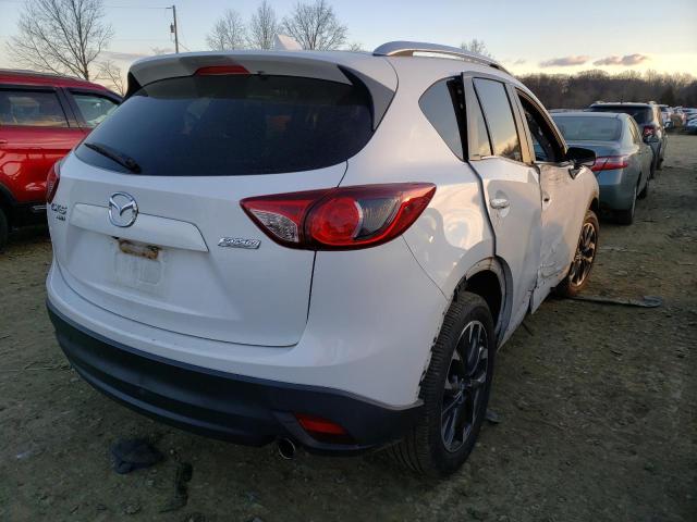 Photo 3 from auction – 2013 MAZDA CX-5 TOURI with VIN JM3KE4CEXD0162594