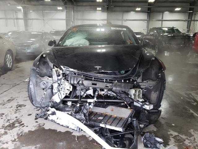 Photo 5 from auction – 2022 TESLA MODEL 3 with VIN 5YJ3E1EA2NF289574